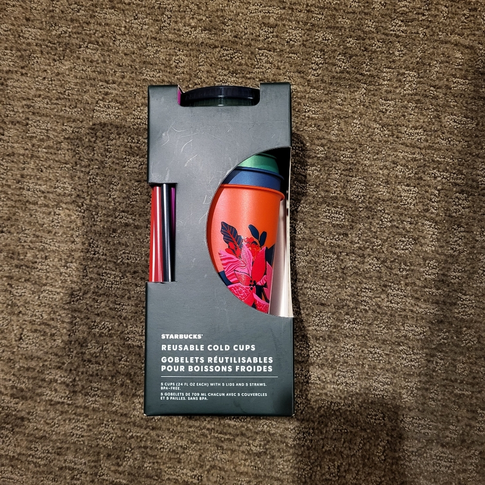 5 Starbucks cups with lids and straws